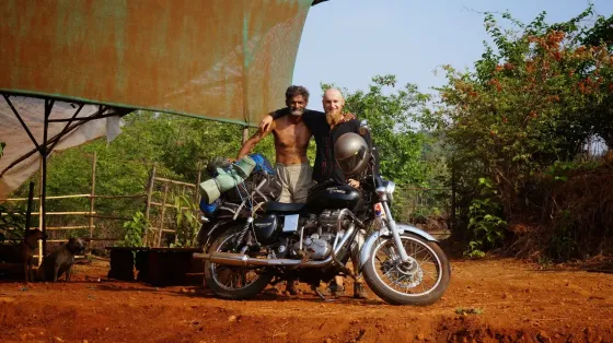 People gathered with a motorbike in India